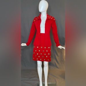 Red microsuede suit with gold grommets (jacket small; skirt: waist 29, hip 38)